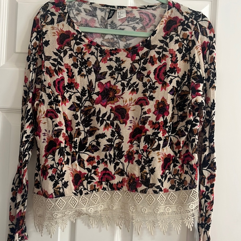 Divided floral sweater